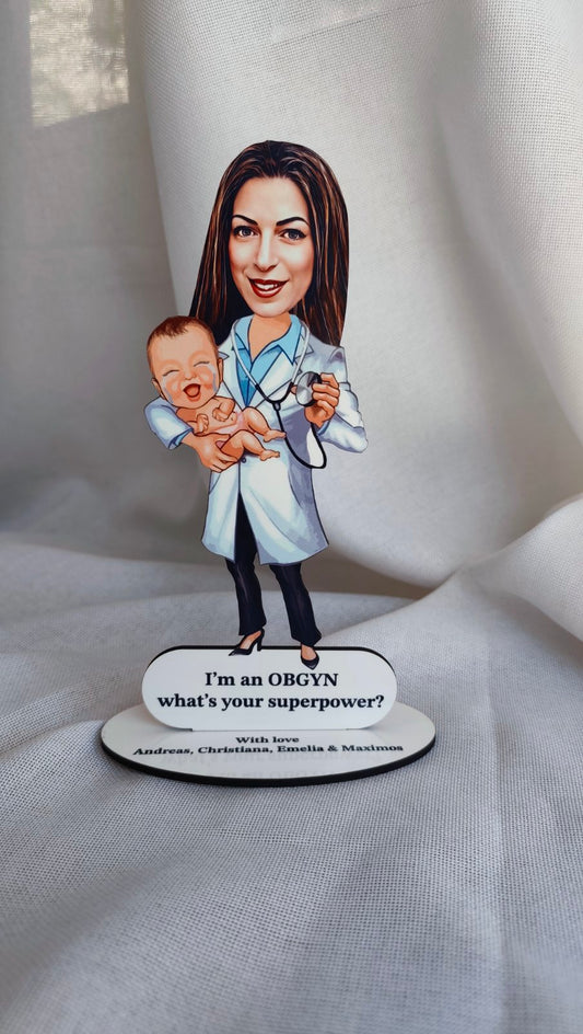 Caricature of a doctor holding a baby with a sign below on a white background